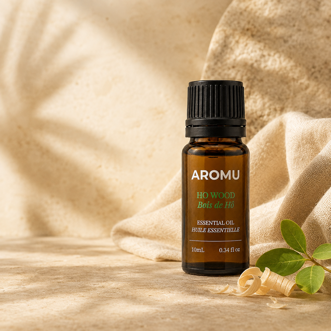 AROMU Ho Wood Essential Oil in warm natural light