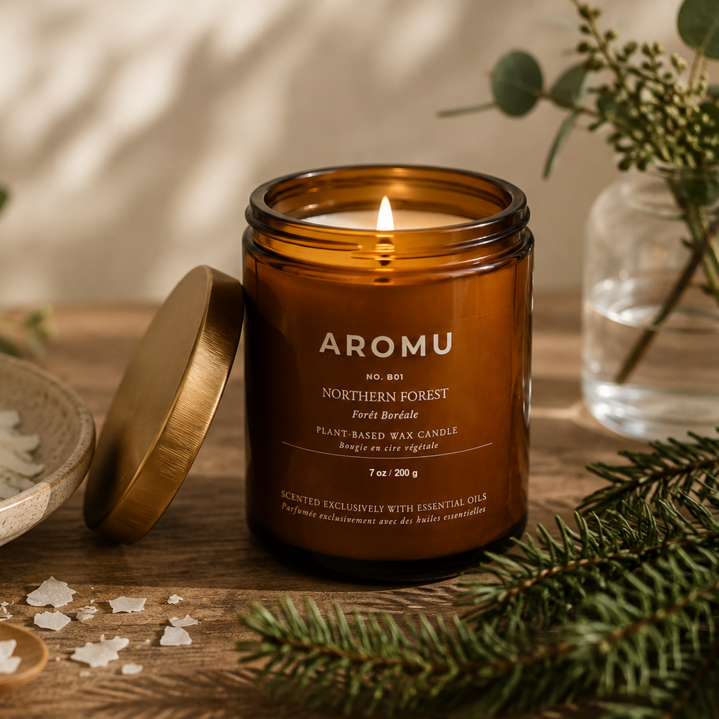 Northern Forest Essential Oil Candle burning with Black Spruce and Fir Needle