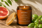 Citrus Grove essential oil candle burning with grapefruit and basil