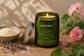 Soft Balance essential oil candle burning with geranium and lavender