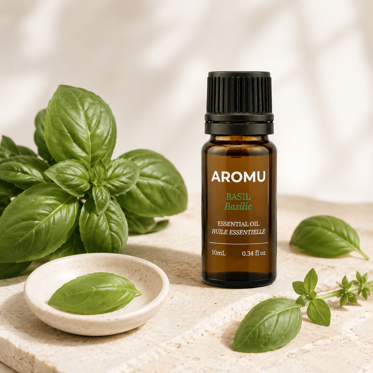 Fresh basil leaves and AROMU Basil Essential Oil