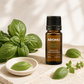 Fresh basil leaves and AROMU Basil Essential Oil