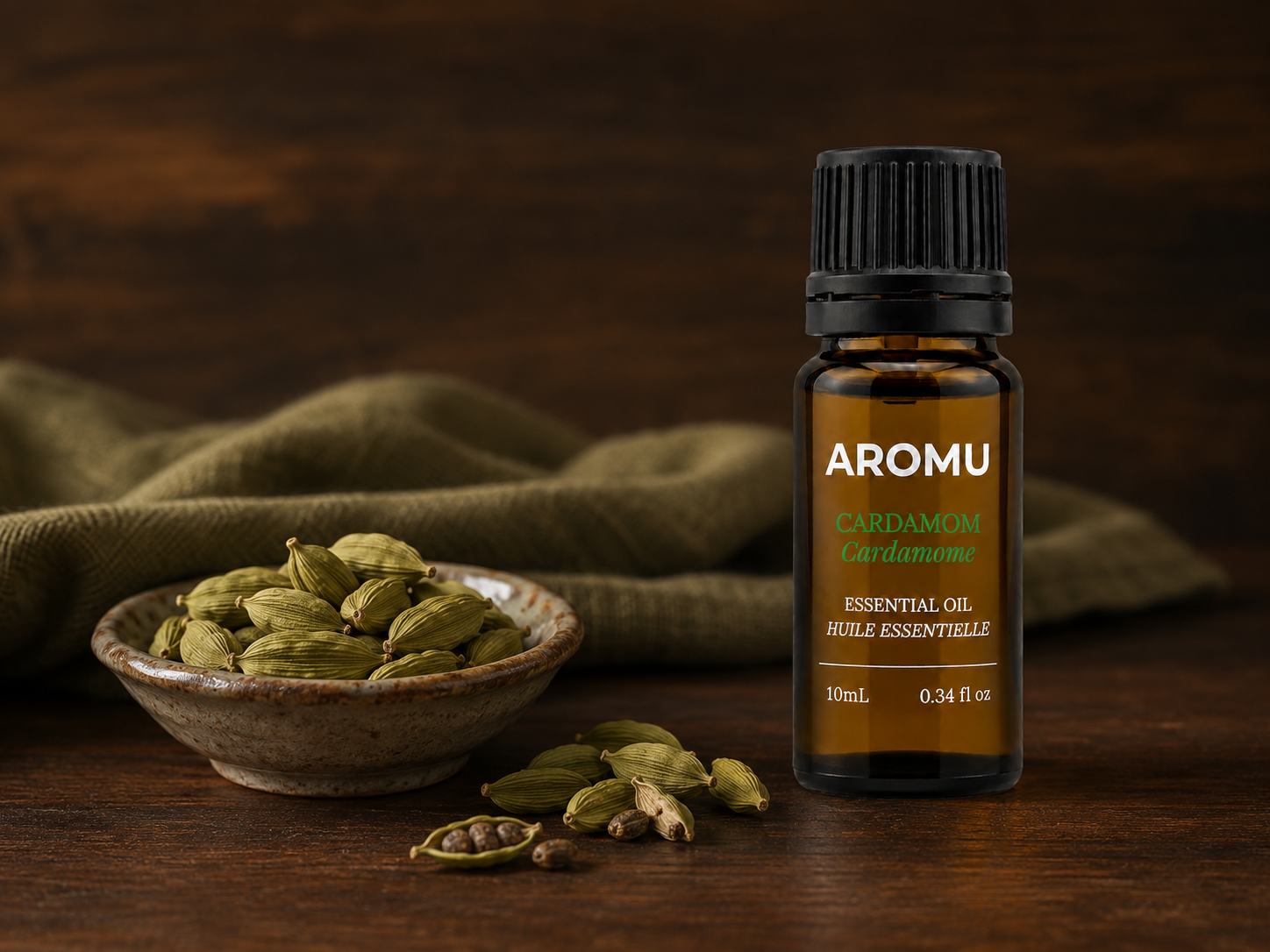 AROMU Cardamom Essential Oil in a warm aromatic setting