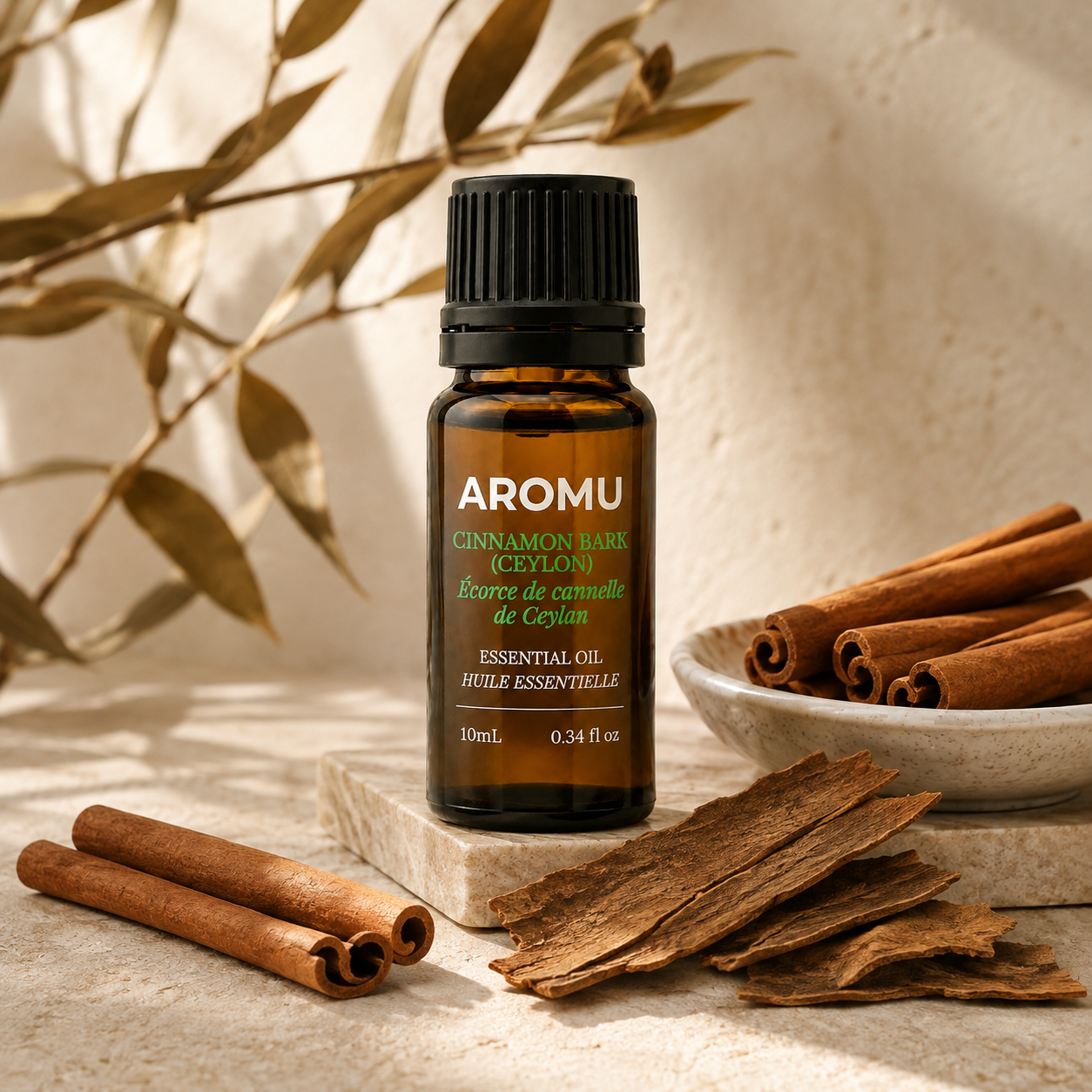 AROMU Cinnamon Bark Ceylon Essential Oil botanical still life