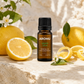 AROMU Lemon Essential Oil with fresh lemons and citrus blossoms